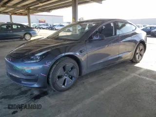 2023 Tesla Model 3 Long Range with VIN 5YJ3E1EB3PF705515, listed as a Copart auction lot 48668035 with 10,618 mi miles and Salvage Title. Bid and sale history available at DreamBid. Image 1.