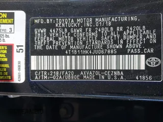 2018 Toyota Camry LE z VIN 4T1B11HK4JU067885, wystawiony jako IAAI lot #41885909 z przebiegiem 122 020 mil mil oraz . Historia ofert i sprzedaży dostępna na DreamBid. Obrazek 9.