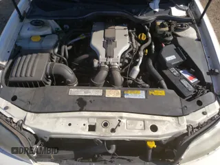 2001 Cadillac Catera z VIN W06VR54RX1R070430, wystawiony jako Copart lot #37051650 z przebiegiem 74 568 mil mil oraz Szkody całkowita. Historia ofert i sprzedaży dostępna na DreamBid. Obrazek 7.