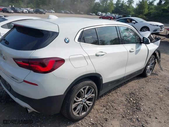 2022 BMW X2 sDrive28i with VIN WBXYH9C04N5U11829, listed as a IAAI auction lot 40184510 with 59,426 mi miles. Bid and sale history available at carsss.com. Image 4.