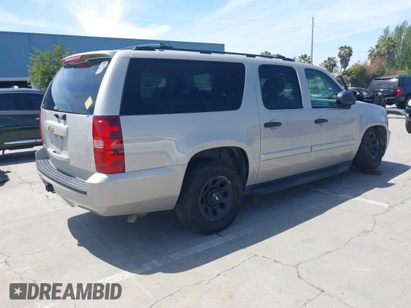 2007 Chevrolet Suburban LS with VIN 1GNFC16027J202168, listed as a IAAI auction lot 42100210 with Not Provided miles and . Bid and sale history available at DreamBid. Image 4.