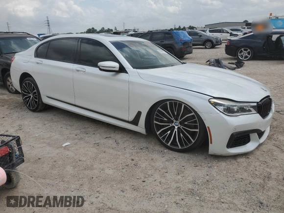 2019 BMW 7 Series 750i с VIN WBA7F0C52KGM24906, выставлен на аукционе Copart как лот 53934735 с пробегом 96 247 миль миль и Списание • Salvage title. История ставок и продаж доступна на DreamBid. Изображение 4.