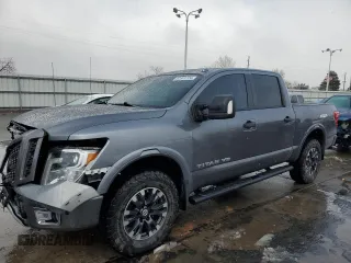 2018 Nissan Titan Pro-4X z VIN 1N6AA1E51JN536680, wystawiony jako Copart lot #82361724 z przebiegiem 98 699 mil mil oraz Szkoda całkowita • Salvage title. Historia ofert i sprzedaży dostępna na DreamBid. Obrazek 1.