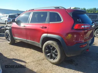 2017 Jeep Cherokee Trailhawk z VIN 1C4PJMBS9HW502323, wystawiony jako IAAI lot #42293817 z przebiegiem 153 127 mil mil oraz . Historia ofert i sprzedaży dostępna na DreamBid. Obrazek 3.