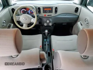 2010 Nissan Cube S z VIN JN8AZ2KR9AT166104, wystawiony jako Copart lot #55290045 z przebiegiem 147 372 mil mil oraz Szkoda całkowita • Salvage title. Historia ofert i sprzedaży dostępna na DreamBid. Obrazek 8.