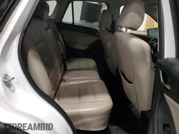 2014 Mazda CX-5 Grand Touring with VIN JM3KE4DY9E0343616, listed as a Copart auction lot 46427715 with 205,325 mi miles and Salvage Title. Bid and sale history available at carsss.com. Image 11.