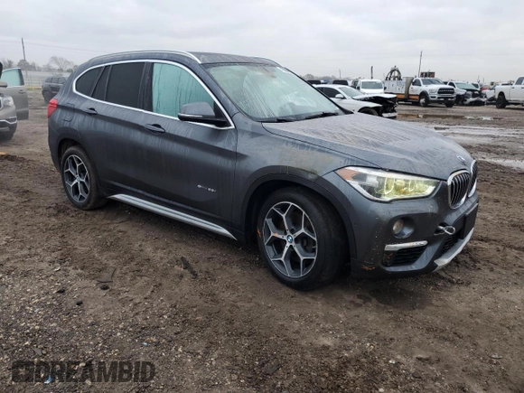 2017 BMW X1 sDrive28i with VIN WBXHU7C3XH5H38074, listed as a Copart auction lot 43088995 with 98,820 mi miles and Salvage Title. Bid and sale history available at carsss.com. Image 4.