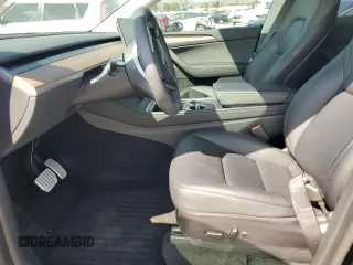 2022 Tesla Model Y Performance with VIN 7SAYGDEF6NF524171, listed as a Copart auction lot 60736945 with 30,629 mi miles and Salvage title. Bid and sale history available at DreamBid. Image 7.