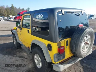 2005 Jeep Wrangler X with VIN 1J4FA39S25P374373, listed as a IAAI auction lot 41754017 with 195,156 mi miles. Bid and sale history available at carsss.com. Image 3.