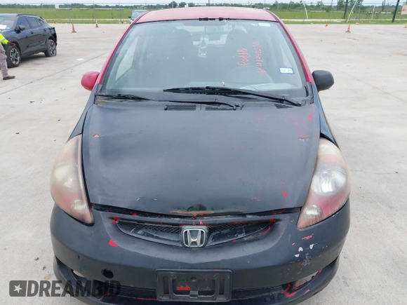 2007 Honda Fit Sport z VIN JHMGD38617S012202, wystawiony jako IAAI lot #42440286 z przebiegiem 134 695 mil mil oraz . Historia ofert i sprzedaży dostępna na DreamBid. Obrazek 6.