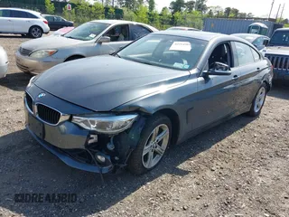 2015 BMW 4 Series 428i xDrive with VIN WBA4C9C55FD331921, listed as a IAAI auction lot 42214901 with 94,970 mi miles and . Bid and sale history available at DreamBid. Image 20.