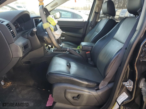 2009 Jeep Grand Cherokee Laredo with VIN 1J8GR48K19C533447, listed as a Copart auction lot 48700275 with 115,991 mi miles and Salvage Title. Bid and sale history available at carsss.com. Image 7.