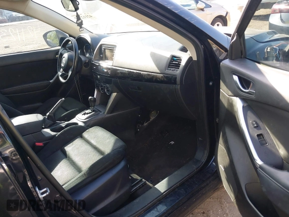 2014 Mazda CX-5 Touring z VIN JM3KE4CY4E0328880, wystawiony jako IAAI lot #42112302 z przebiegiem 185 228 mil mil oraz . Historia ofert i sprzedaży dostępna na DreamBid. Obrazek 5.