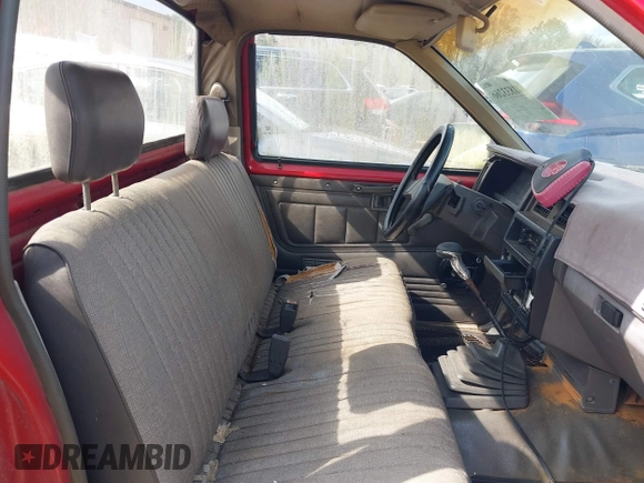 1987 Nissan Hardbody z VIN 1N6ND11S5HC335231, wystawiony jako IAAI lot #41833266 z przebiegiem 199 899 mil mil oraz . Historia ofert i sprzedaży dostępna na DreamBid. Obrazek 5.