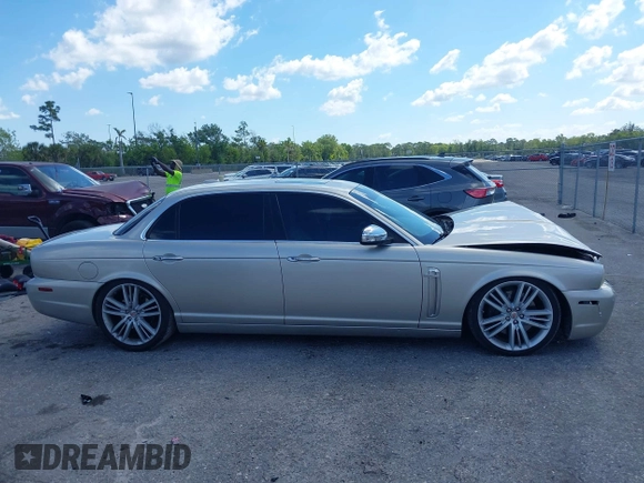 2009 Jaguar XJ with VIN SAJWA94C49TH30042, listed as a IAAI auction lot 41898085 with 145,832 mi miles and . Bid and sale history available at DreamBid. Image 13.