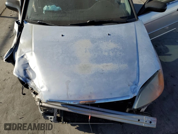 2001 Honda Civic LX with VIN 2HGES16551H562161, listed as a Copart auction lot 71089984 with 0 mi miles and Salvage Title. Bid and sale history available at carsss.com. Image 12.