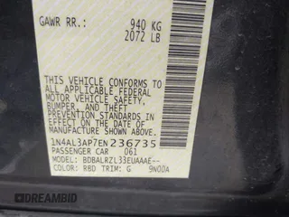2014 Nissan Altima 2.5 S with VIN 1N4AL3AP7EN236735, listed as a IAAI auction lot 42079042 with 130,873 mi miles. Bid and sale history available at carsss.com. Image 9.