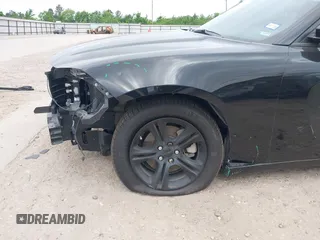 2023 Dodge Charger SXT z VIN 2C3CDXBG6PH656928, wystawiony jako IAAI lot #42027238 z przebiegiem 29 921 mil mil oraz . Historia ofert i sprzedaży dostępna na DreamBid. Obrazek 18.