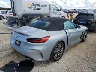 2022 BMW Z4 sDrive30i with VIN WBAHF3C06NWX82076, listed as a Copart auction lot 75177644 with 2,824 mi miles and Salvage Title. Bid and sale history available at carsss.com. Image 3.