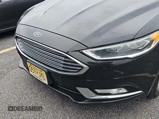 2017 Ford Fusion SE with VIN 3FA6P0T9XHR338359, listed as a IAAI auction lot 42573127 with 130,983 mi miles and . Bid and sale history available at DreamBid. Image 1.
