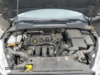2015 Ford Focus Titanium z VIN 1FADP3N25FL324390, wystawiony jako Copart lot #59801805 z przebiegiem 97 615 mil mil oraz Szkoda całkowita • Salvage title. Historia ofert i sprzedaży dostępna na DreamBid. Obrazek 11.