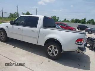 2003 Ford F-150 XLT with VIN 1FTRW07L13KB48589, listed as a IAAI auction lot 42647398 with Not provided miles and . Bid and sale history available at DreamBid. Image 3.