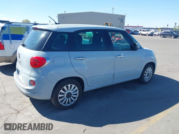 2014 FIAT 500L Easy with VIN ZFBCFABH9EZ010519, listed as a IAAI auction lot 42150633 with 60,724 mi miles. Bid and sale history available at carsss.com. Image 4.