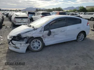 2010 Honda Insight EX z VIN JHMZE2H75AS007066, wystawiony jako Copart lot #54910995 z przebiegiem 107 658 mil mil oraz Szkoda całkowita • Salvage title. Historia ofert i sprzedaży dostępna na DreamBid. Obrazek 1.