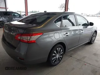2015 Nissan Sentra S with VIN 3N1AB7AP9FY256920, listed as a IAAI auction lot 41491292 with 163,404 mi miles and . Bid and sale history available at DreamBid. Image 4.