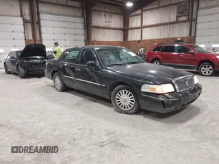 2008 Mercury Grand Marquis LS z VIN 2MEFM75V18X617284, wystawiony jako IAAI lot #41948364 z przebiegiem 106 294 mil mil oraz . Historia ofert i sprzedaży dostępna na DreamBid. Obrazek 1.