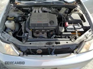 2000 Toyota Avalon XL with VIN 4T1BF28B3YU002835, listed as a Copart auction lot 50902115 with 128,699 mi miles and Salvage Title. Bid and sale history available at DreamBid. Image 11.