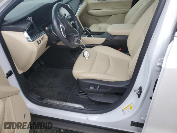 2018 Cadillac XT5 FWD with VIN 1GYKNARS1JZ222767, listed as a Copart auction lot 57989015 with 33,464 mi miles and Salvage title. Bid and sale history available at DreamBid. Image 7.