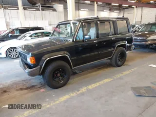 1991 Isuzu Trooper z VIN JACCH58R8M7902476, wystawiony jako IAAI lot #41893980 z przebiegiem 169 269 mil mil oraz . Historia ofert i sprzedaży dostępna na DreamBid. Obrazek 17.