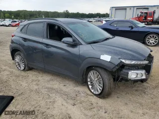 2021 Hyundai Kona SEL with VIN KM8K22AA3MU750671, listed as a Copart auction lot 69874054 with 30,024 mi miles and Salvage Title. Bid and sale history available at carsss.com. Image 4.
