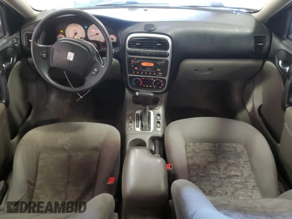 2003 Saturn LS z VIN 1G8JW54R43Y514930, wystawiony jako Copart lot #63652944 z przebiegiem 178 497 mil mil oraz Nie do naprawy. Historia ofert i sprzedaży dostępna na DreamBid. Obrazek 8.