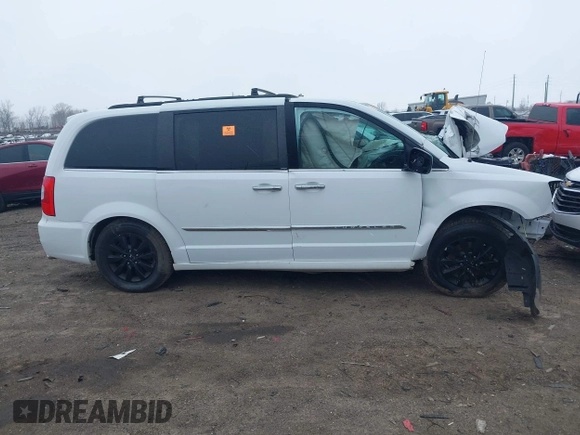 2014 Chrysler Town & Country Touring L with VIN 2C4RC1CG2ER189177, listed as a IAAI auction lot 41978563 with Not Provided miles and . Bid and sale history available at DreamBid. Image 12.