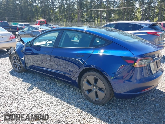 2023 Tesla Model 3 z VIN 5YJ3E1EA9PF639141, wystawiony jako IAAI lot #42167773 z przebiegiem 57 459 mil mil oraz . Historia ofert i sprzedaży dostępna na DreamBid. Obrazek 3.