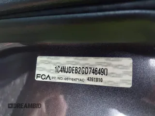 2016 Jeep Compass High Altitude Edition with VIN 1C4NJDEB2GD746490, listed as a IAAI auction lot 41704628 with 95,732 mi miles. Bid and sale history available at carsss.com. Image 9.