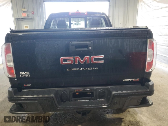 2021 GMC Canyon 4WD AT4 w/Leather with VIN 1GTG6FEN8M1255144, listed as a Copart auction lot 50186815 with 43,610 mi miles and Salvage Title. Bid and sale history available at carsss.com. Image 6.