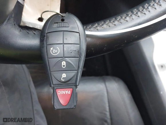 2013 Jeep Grand Cherokee Limited with VIN 1C4RJFBG0DC656382, listed as a IAAI auction lot 41870162 with 162,869 mi miles. Bid and sale history available at carsss.com. Image 11.