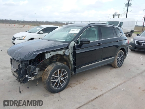 2020 Volkswagen Tiguan SE with VIN 3VV3B7AX7LM067046, listed as a IAAI auction lot 41697405 with 53,573 mi miles and . Bid and sale history available at DreamBid. Image 17.
