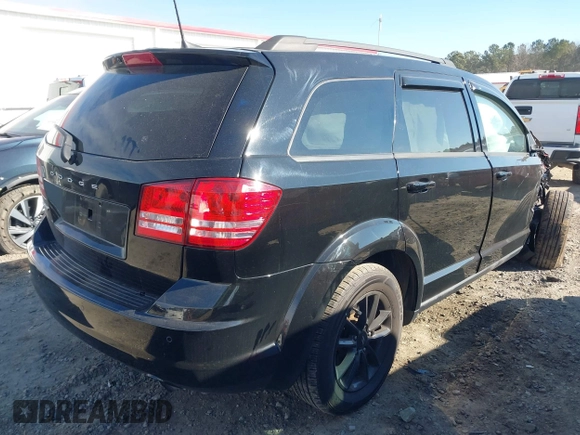 2020 Dodge Journey SE Value with VIN 3C4PDCABXLT259462, listed as a IAAI auction lot 41330782 with 67,380 mi miles and . Bid and sale history available at carsss.com. Image 4.