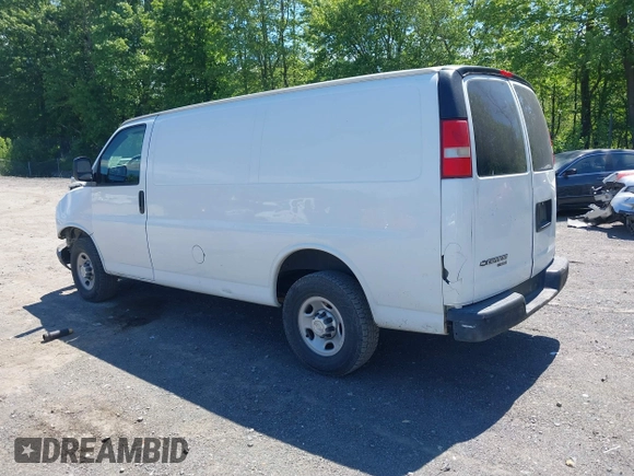 2014 Chevrolet Express Cargo Van with VIN 1GCWGFCA2E1210307, listed as a IAAI auction lot 39559260 with 213,814 mi miles. Bid and sale history available at carsss.com. Image 3.