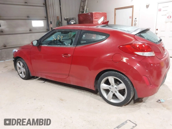 2013 Hyundai Veloster w/Gray Int with VIN KMHTC6AD2DU136990, listed as a IAAI auction lot 41363689 with 74,594 mi miles. Bid and sale history available at carsss.com. Image 3.