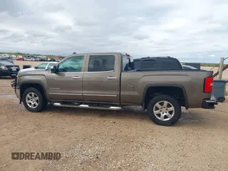 2015 GMC Sierra 1500 SLT with VIN 3GTU2VEC9FG173158, listed as a IAAI auction lot 41934631 with 207,226 mi miles and . Bid and sale history available at DreamBid. Image 14.