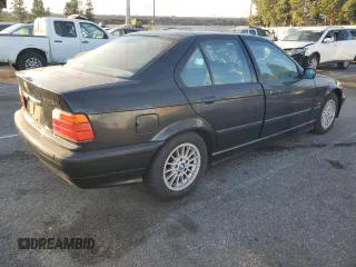 1997 BMW 3 Series 328iA with VIN WBACD4325VAV48712, listed as a Copart auction lot 80376064 with 158,118 mi miles and Salvage Title. Bid and sale history available at carsss.com. Image 3.