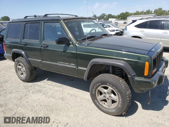 1998 Jeep Cherokee Sport with VIN 1J4FJ68S3WL150458, listed as a Copart auction lot 63278935 with 176,314 mi miles and Clean title. Bid and sale history available at DreamBid. Image 4.