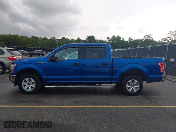 2018 Ford F-150 XL with VIN 1FTEW1CB2JFC79764, listed as a IAAI auction lot 42378319 with 69,571 mi miles and . Bid and sale history available at DreamBid. Image 14.