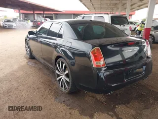 2012 Chrysler 300 S with VIN 2C3CCABGXCH313095, listed as a IAAI auction lot 41789401 with 186,302 mi miles and . Bid and sale history available at carsss.com. Image 3.