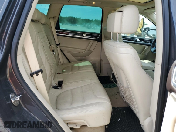 2013 Volkswagen Touareg Lux with VIN WVGEF9BP8DD002947, listed as a Copart auction lot 52590164 with 144,831 mi miles and Salvage Title. Bid and sale history available at DreamBid. Image 11.